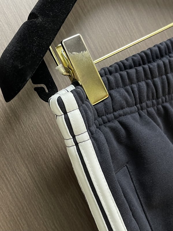 발렌시아가 블루 엠블럼 스트라이프 트랙팬츠 001-189525