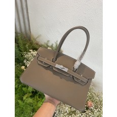 엘리펀트 그레이 스위프트 가죽 핸드백 001-223889