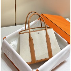 에르메스 가든파티 캔버스 가죽 핸드백 001-223919