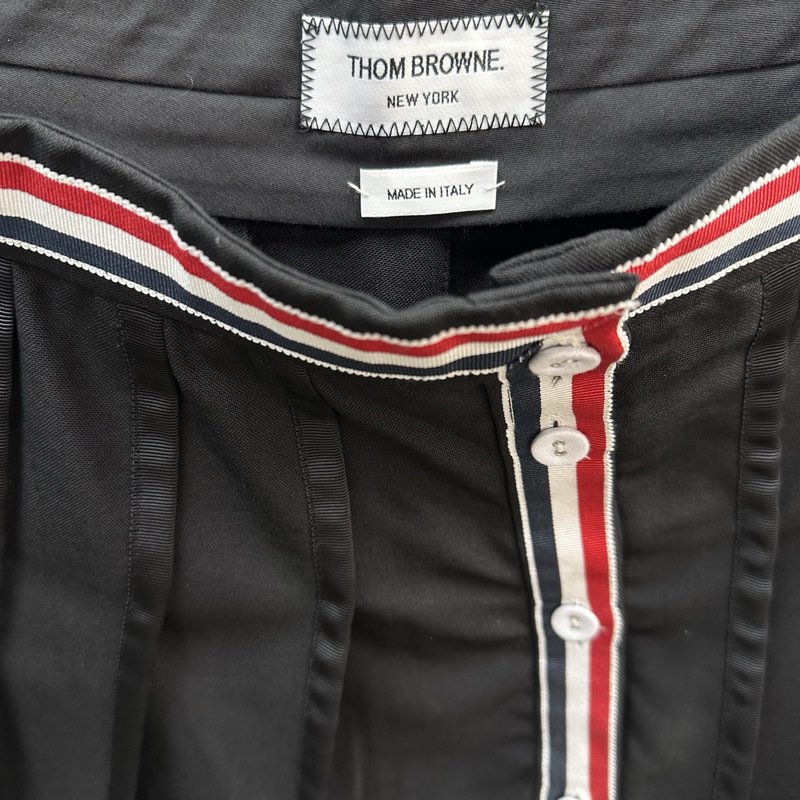 Thom Browne 여성 울 플리츠 스커트 001-229559