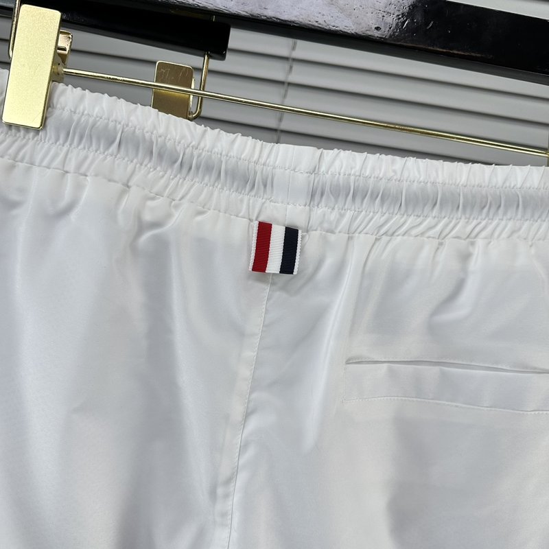 톰 브라운 사선 스트라이프 속건 반바지 001-230459