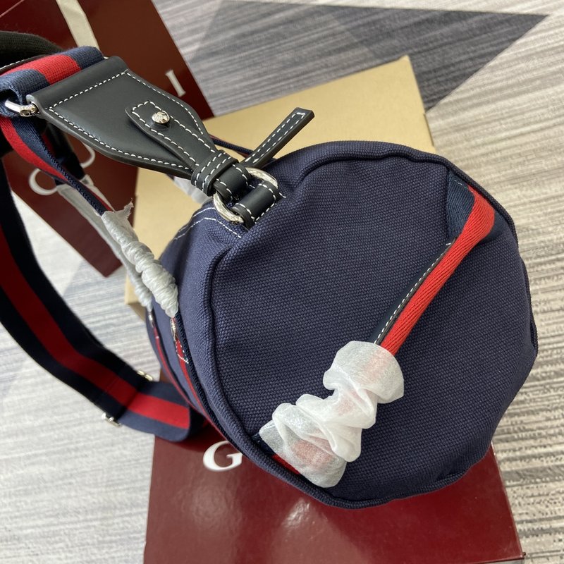 구찌 블루 캔버스 원통형 핸드백 001-247290