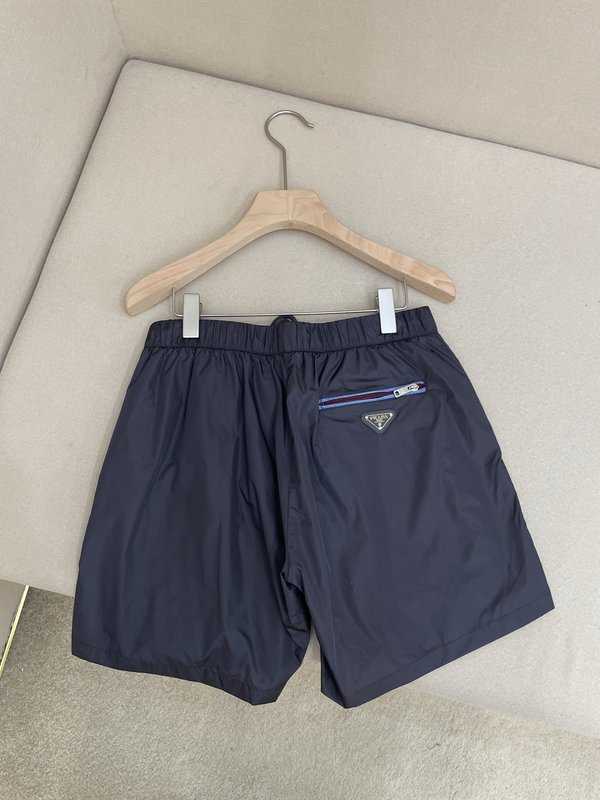 프라다 트라이앵글 로고 지퍼 나일론 반바지 001-256610
