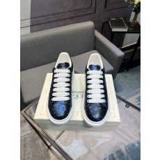Alexander McQueen 클래식 화이트 스니커즈 001-271104