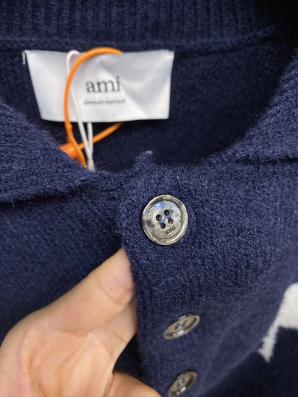 AMI Paris 하트 자카드 메리노 울 폴로 셔츠 001-271833