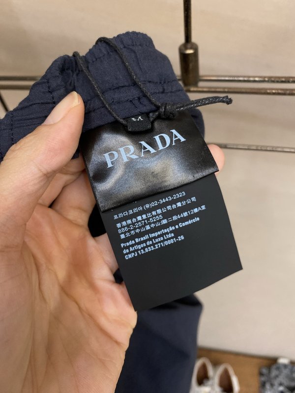 Prada 레터링 라벨 린넨 혼방 면 롱팬츠 001-275490