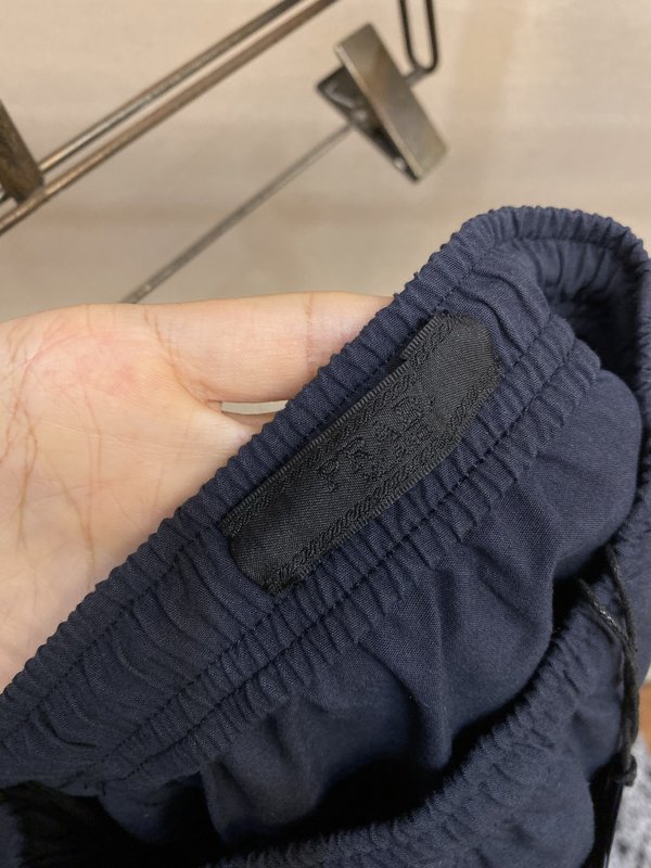 Prada 레터링 라벨 린넨 혼방 면 롱팬츠 001-275490