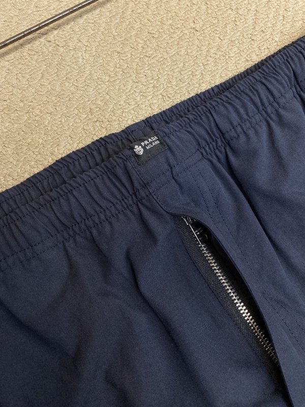 Prada 레터링 라벨 린넨 혼방 면 롱팬츠 001-275490