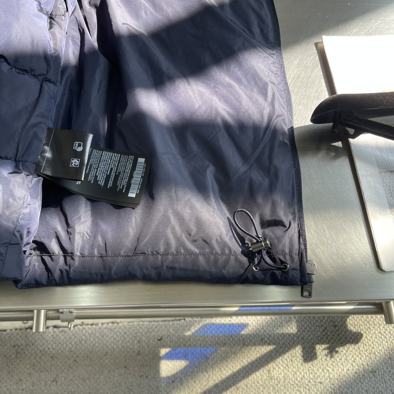 삼각 로고 포켓 패딩 001-276754