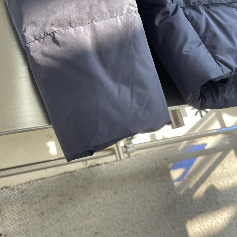 삼각 로고 포켓 패딩 001-276754