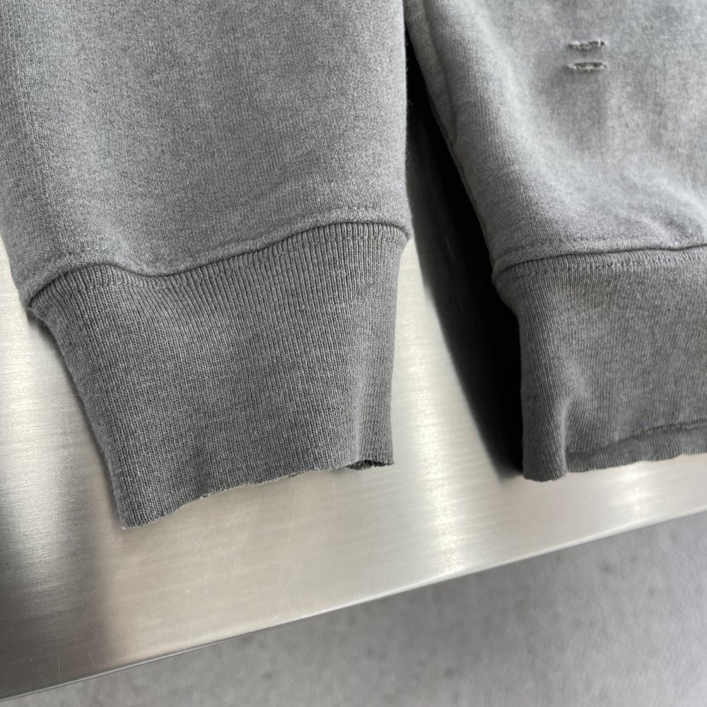 Acne Studios 구멍 뚫린 빈티지 로고 지퍼 재 001-283084