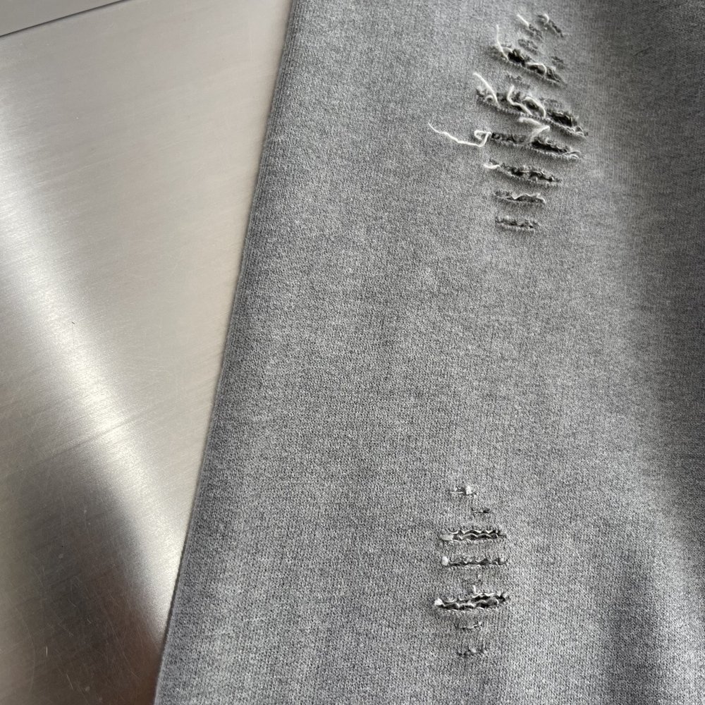 Acne Studios 구멍 뚫린 빈티지 로고 지퍼 재 001-283084
