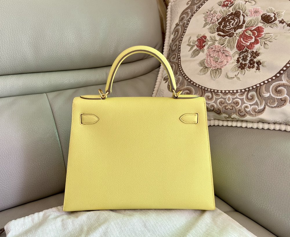 에르메스 켈리 28cm 9R 레몬옐로우 골드버클 핸드메 001-283444