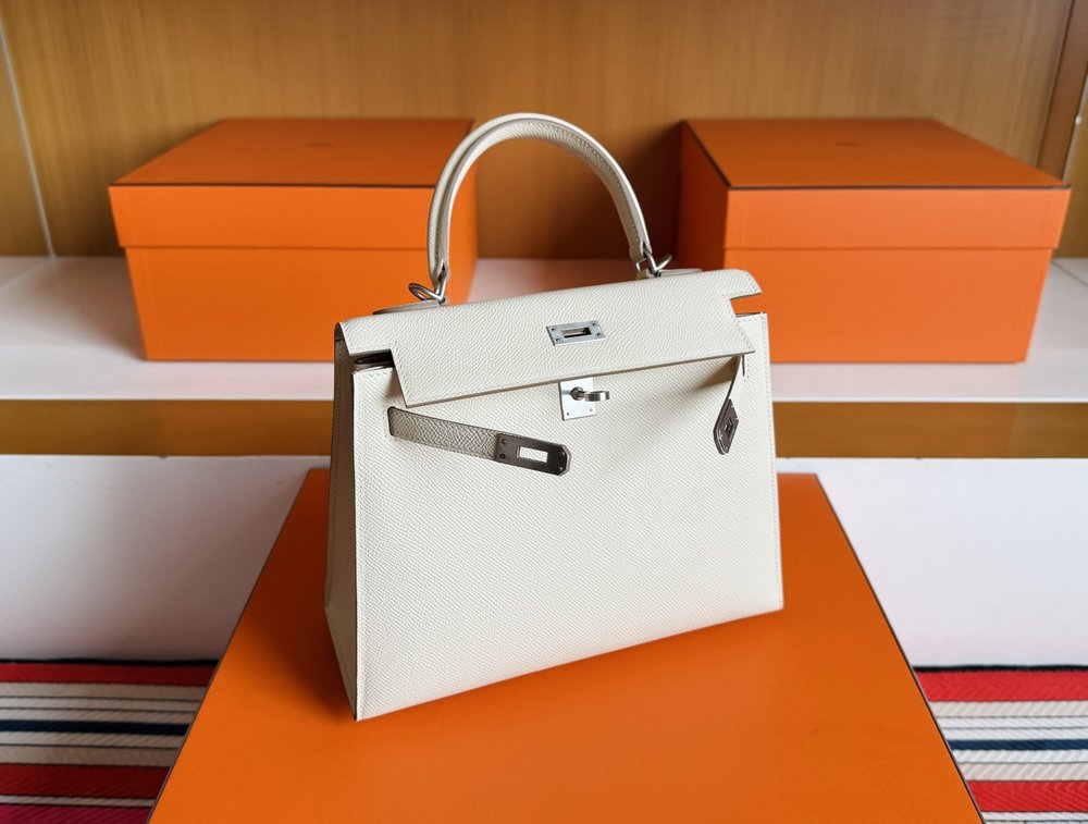 켈리 25cm 밀크쉐이크 화이트 에프솜 가죽 실버 001-283606
